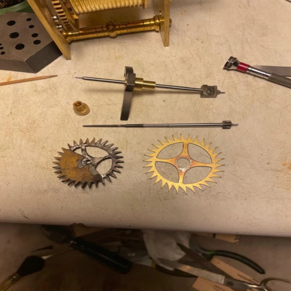 Grandfather clock movement disassembled for repair