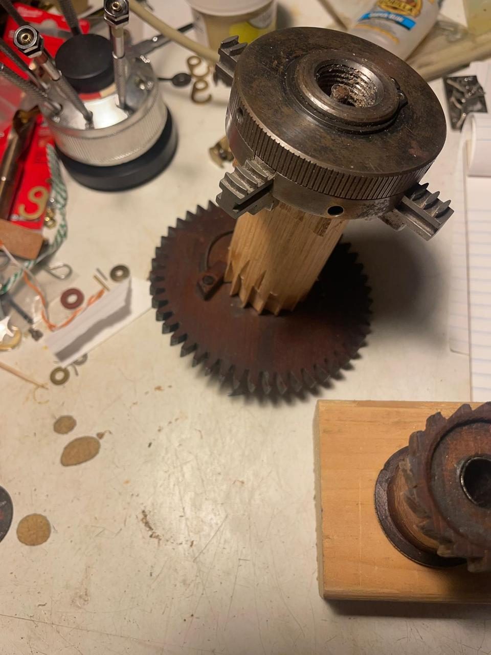 Clock movement gears and wheels removed from the case for inspection